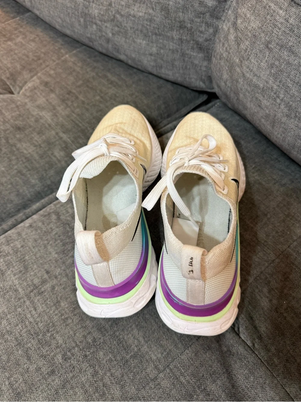 Nike Women’s White Running Sneakers with Iridescent Green-Purple Accent